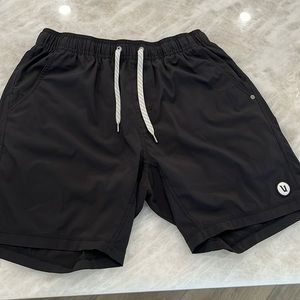 Black athletic shorts with insert lining, side pockets. Great condition.